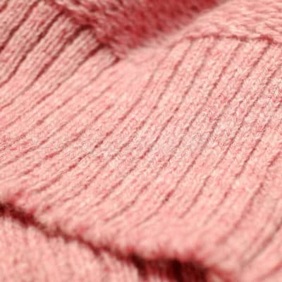 On Knitting with Two Yarns